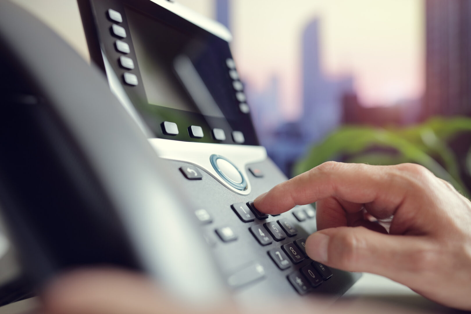 dialing-a-telephone-in-the-office